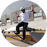 Skater performing grind on rail at Junction Skate & BMX Park